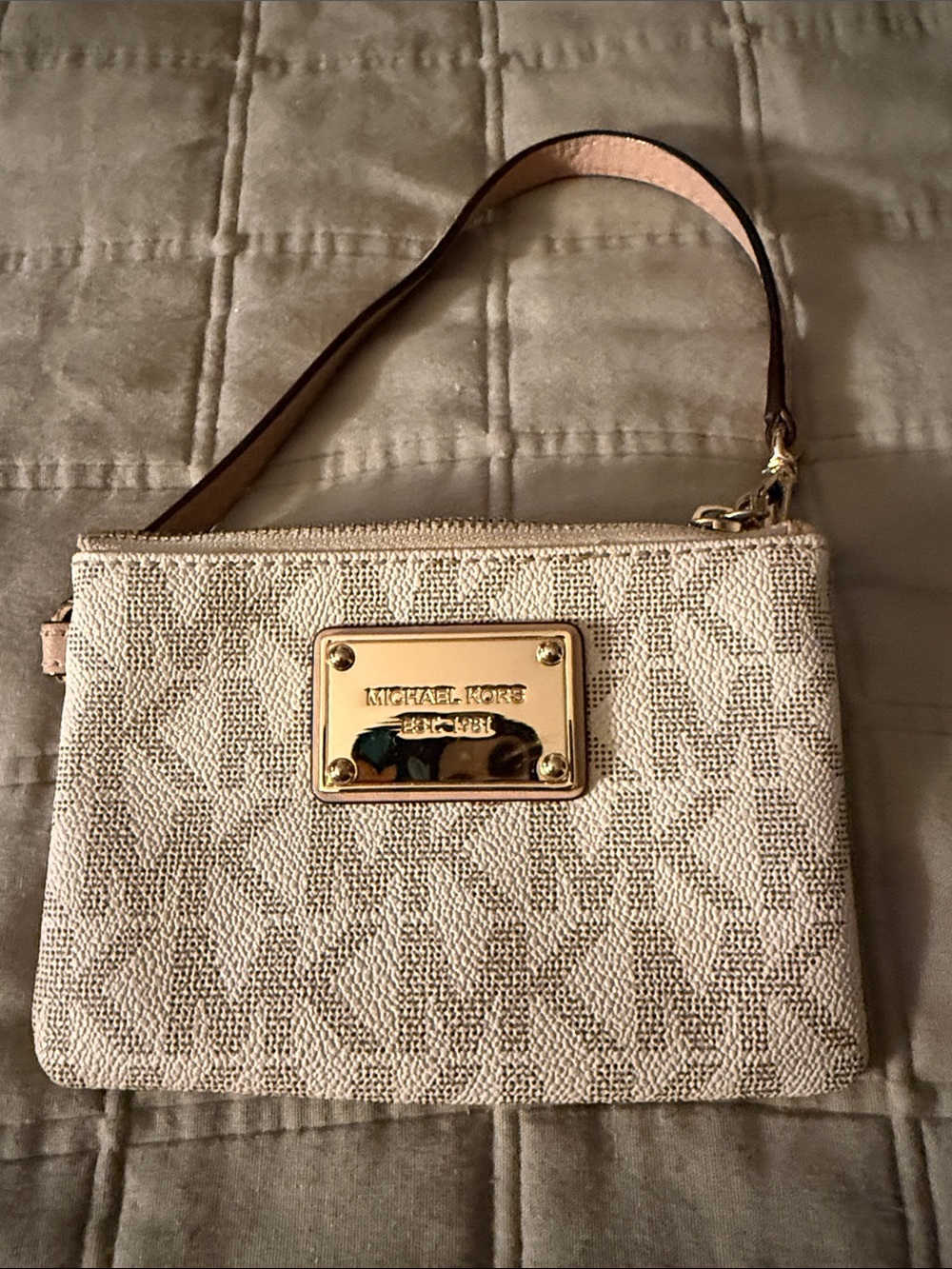 Michael Kors Beige Logo Wristlet with Gold Plaque